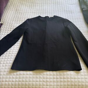 The Row Classic Black scuba long sleeve top
